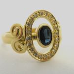 'Halo Ring' In 18ct Yellow Gold Diamonds And Sapphire