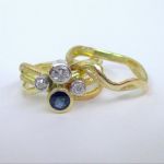 Sapphire Squiggle Engagement Ring With Matching Wedding Ring