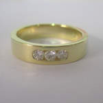 3 diamond channel set 18ct yellow gold ring